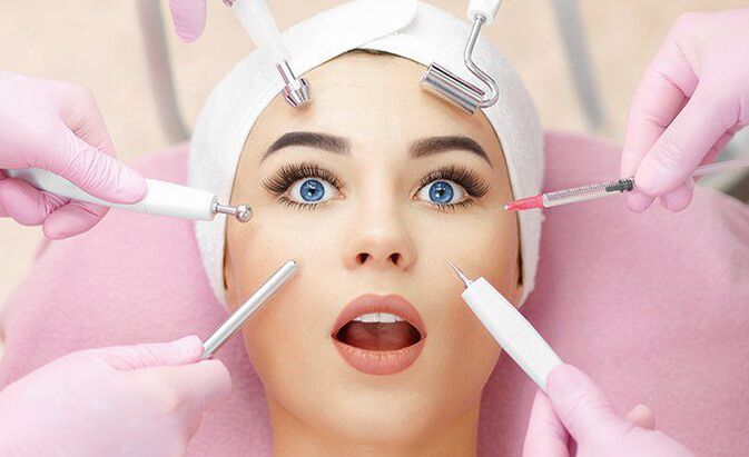 Rejuvenation devices and tools next to the girl's face